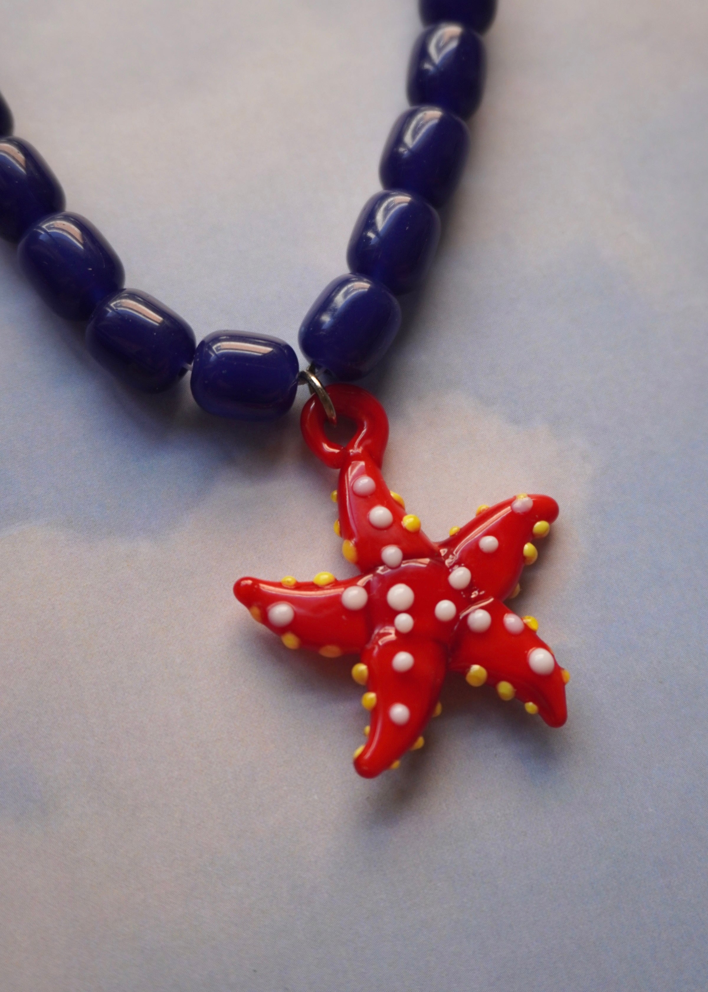 Collar estrella azul