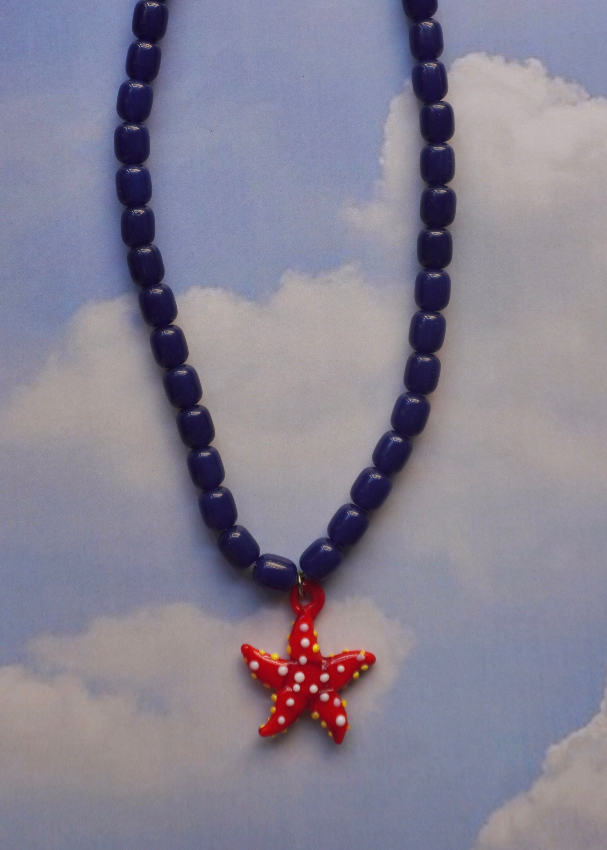 Collar estrella azul
