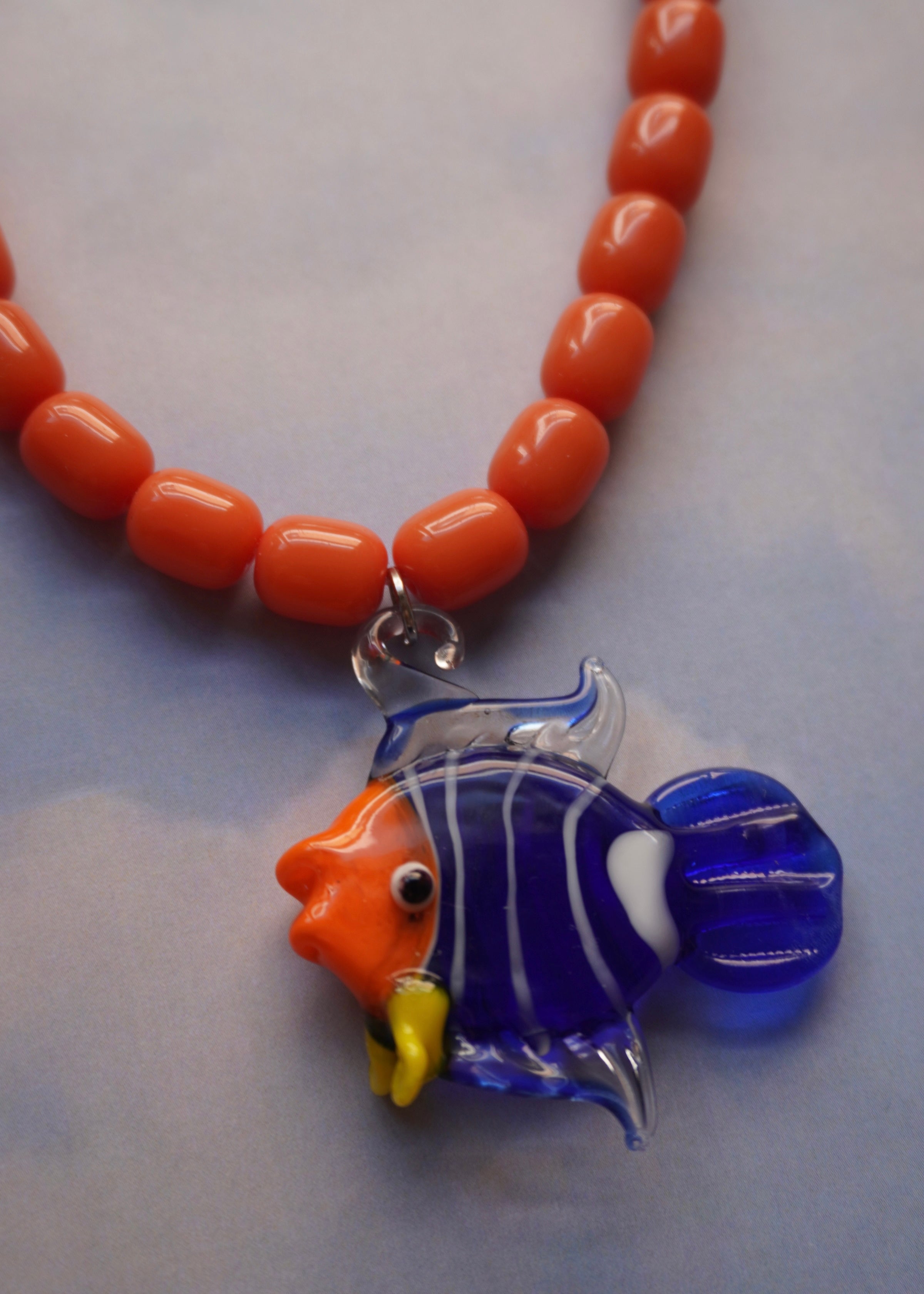 Collar pez azul/naranja
